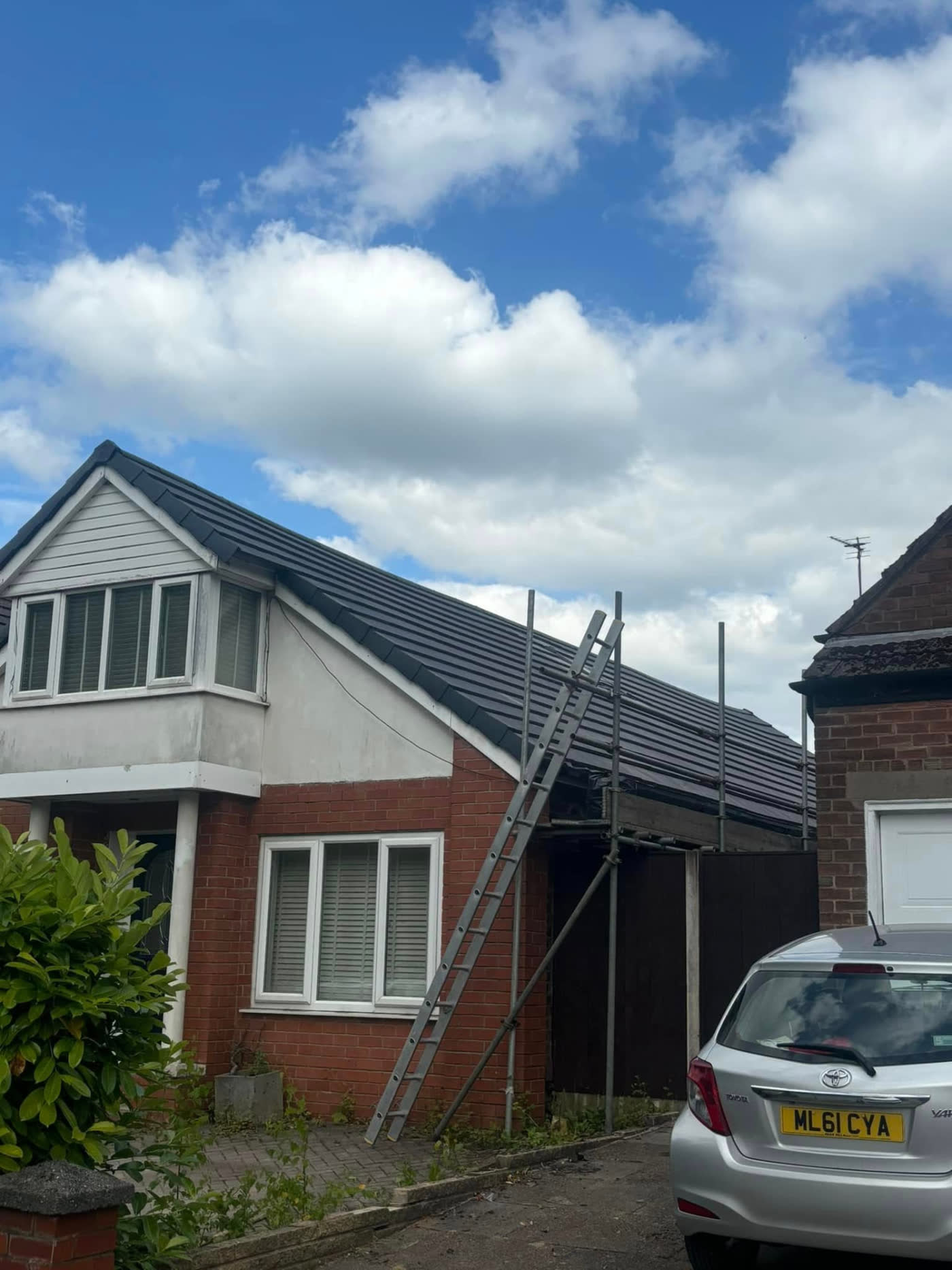New fascias, soffits and dry ridge fitted to a re-roofed detached house by MB Roofline & Joinery in Bury